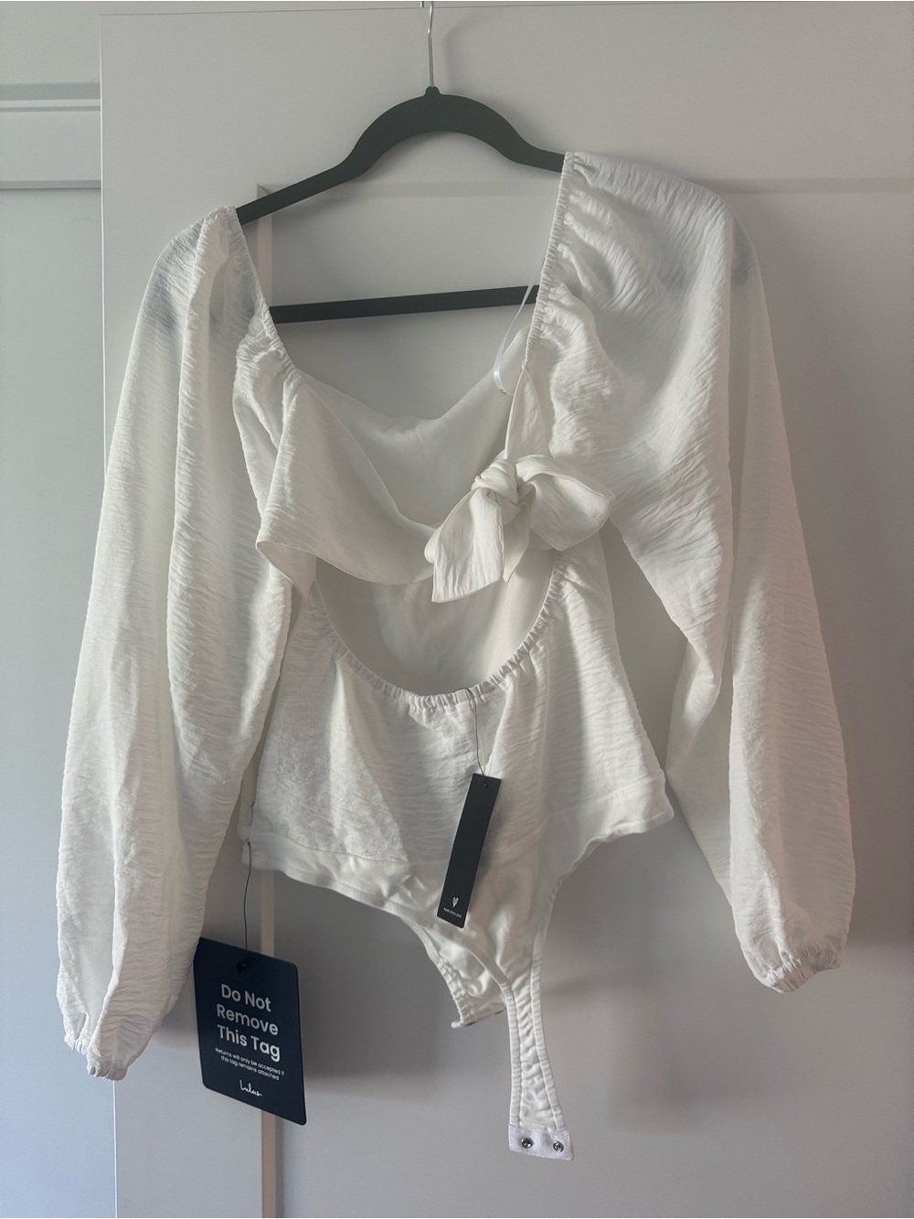 Lulu's White Tie-Front Long Sleeve Bodysuit